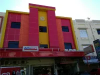 Hotel Alpha Makassar RedPartner Hotel dekat Menara Pinisi UNM