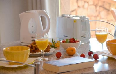 Cuisine Residence Alba Rossa Photo