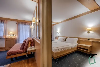 Hotiday Room Collection - Campitello Hotels in Canazei