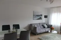 Freshly renovated, bright and friendly apartment with a view of the woods