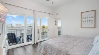 Exclusive PENTHOUSE Footsteps from Madeira Beach! 3BR/3BA with a Heated Pool!