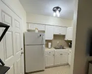 Tastefully Designed, 1st Floor Corner Condo, Steps from the Beach!