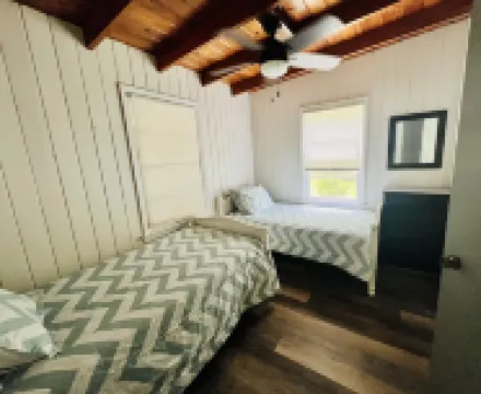 Lake Front Cabin W/ Screened-in Porch and personal dock - Close for Auburn games