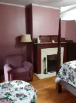4 poster Queen Bed upstairs in Historic Victorian Inn