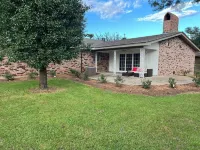 Cozy 4BR Home with Office, Fitness Area, Spacious Backyard & Pet-Friendl Hotels near Malone Stadium