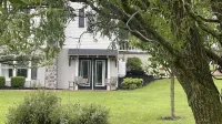 Cozy country basement studio apartment, with a large yard and woods.