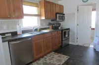 Just steps to the beach, bar, and playground park!