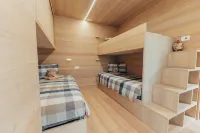 A beautiful wood and glass chalet at the edge of the Forest Hotel in zona Tre Cime Adventure Park