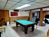 Large Secluded Home w/ Private Pool, Hot-tub, Gym, Game room, and Bar Area.