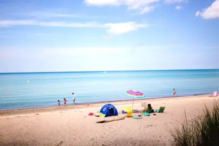 Renew + Relax: Sunny Lakeside Michiana Cottage w/ Hot Tub & Beach