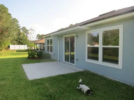 Casa D’ Luna Charming and modern 4-bedroom house with AC and WiFi in Palm Coast Отели в г. Флэглер