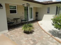 Paradise Central - Cozy 3 BR, 2 Bathroom home with heated pool & lanai Hotels near Gulfcoast Coin & Jewelry