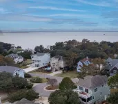 Updated beach house with private pool, hot tub, and community fitness center!