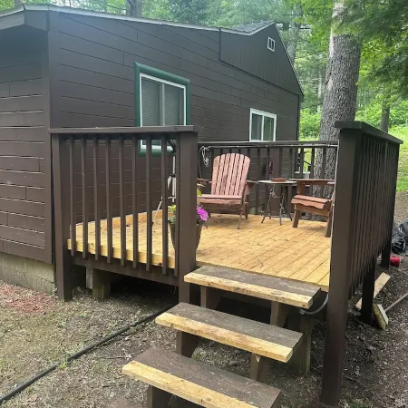 A Stream  runs through it. Comfy little cabin with a stream by your bedroom.