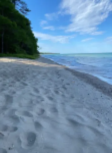 House is located on Lake Huron with a private beach