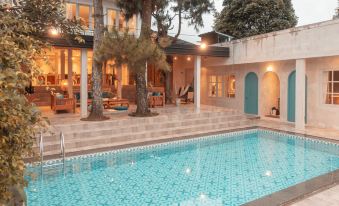 Villa Navi - When a Butterfly Sits on a Flower