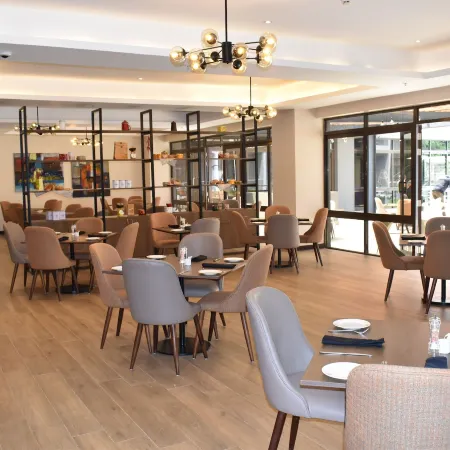 Trademark Suites at Enaki Town Отели рядом с достопримечательностью «Посольство Швеции»