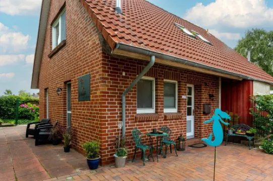 A treasure chest behind the dike at the harbor for two people