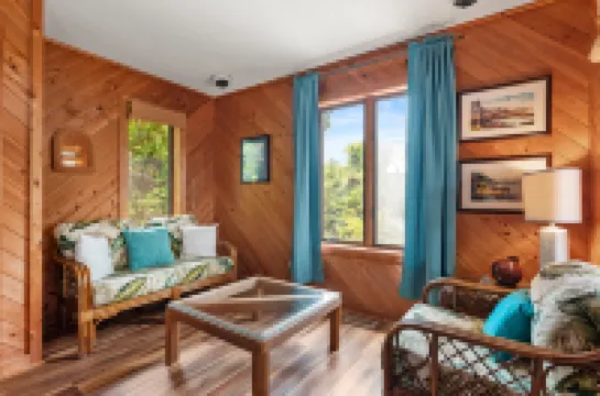 Charming Coastal Escape with Deck and Scenic Sunsets - Delightful Haven