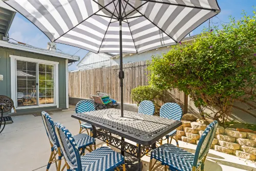 Charming Backyard Oasis with Fire Pit and Boho Vibes - Cozy Retreat