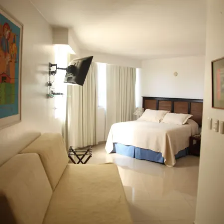 Aparta Hotel Plaza del Sol Отели рядом с достопримечательностью «Автозаправочный комплекс Expreso Bavaro»