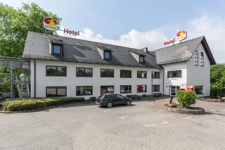 Serways Hotel Heiligenroth Отели в г. Оберельберт