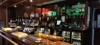 Rivelyn Hotel Bar & Restaurant - bar