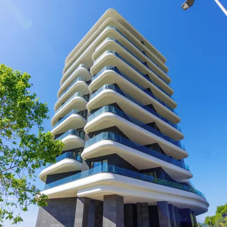 Bellemond Hotel & Residences Отели рядом с достопримечательностью «Пляж Пизана»