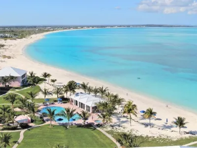 "Pretty in Pink"  Luxury  3-Bedroom, 3-Bathroom Oceanfront Condo Отели в г. 