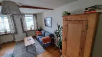 Cozy vacation apartment on the edge of the forest in an old farmhouse 15 minutes from the city