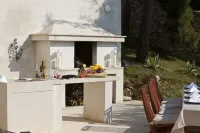 Seafront Villa with Heated Pool & Boat Mooring - Grocery & Chef Service optional Hotel a 