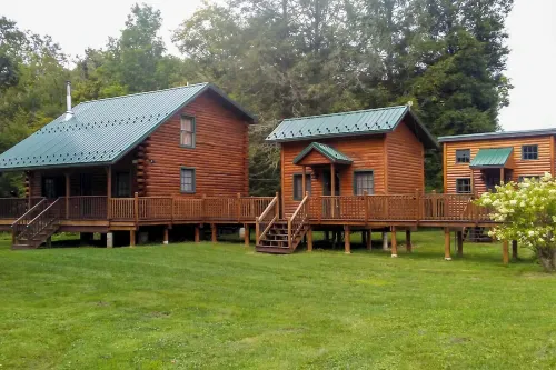Scenic Log Cabin with Fire Pit and Stocked Creek! - Homestays