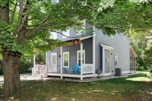 Scenic Wooded Lot with Cozy Fireplace and Fire Pit - Charming Escape