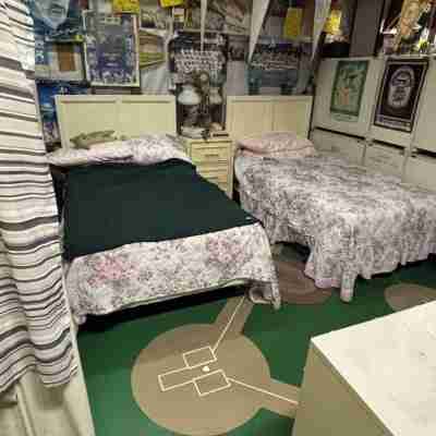Charming baseball themed 2-story building with cable TV, wi-fi & stereo system. Rooms