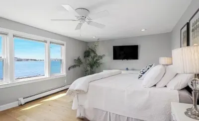 Enjoy Gorgeous Sunsets from Your Waterfront Beach Cottage