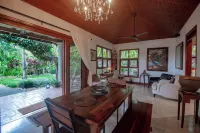 Rancho Santana. Charming garden Casita V-14 surrounded by tropical gardens.