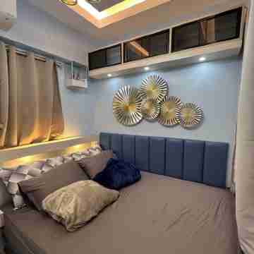 Cozy 1-bedroom with balcony condo with WiFi, AC in brilliant Quezon City Rooms