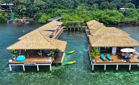 Ocean Light Over Water Bungalow, Bedroom, King Bed, Living Room, Kitchenette