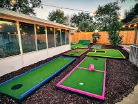 Private 4-bed/3 bath house with putt-putt golf, heated pool, and hot tub.