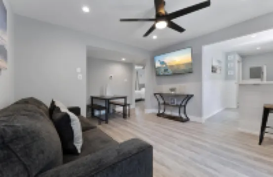 Stainless Steel Appliances and Flat-Screen TV - Modern Coastal Retreat