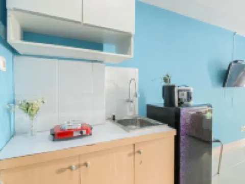 Neat Studio with Blue Toned Wall at Dramaga Tower Apartment By Travelio