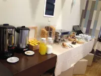 Cosmopolit - Desayuno