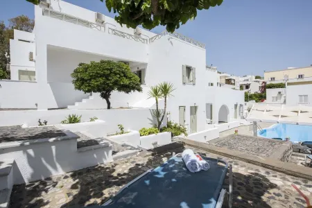 Nissos Thira Отели в г. Санторини