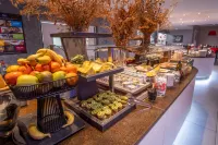 Kyriad Prestige Lyon Est - Saint Priest Eurexpo Hotel and Spa - Desayuno