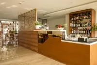 馬尼帕爾茶樹套房飯店 - 酒吧