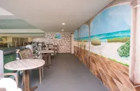 Scenic Ocean front first floor pool view spacius condo for up to 4 adults.