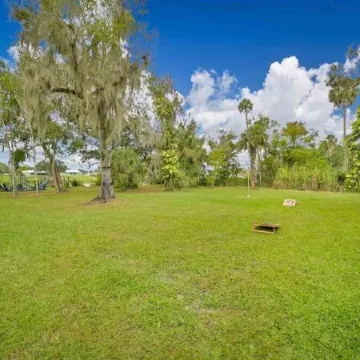 LaBelle Vie, "Riverfront Serenity Bamboo Trails on 3+ acres.