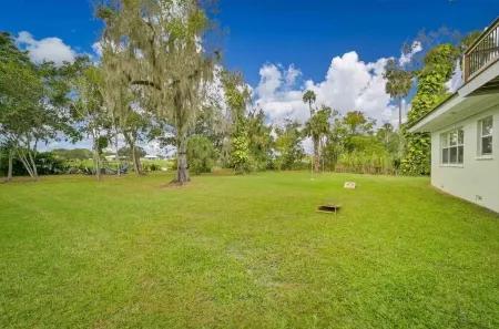 LaBelle Vie, "Riverfront Serenity Bamboo Trails on 3+ acres.