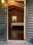 1 Bedroom,1 Bath, Porch, Fire Pit, Grill, Beautiful Wooded Location, Wi-Fi also!