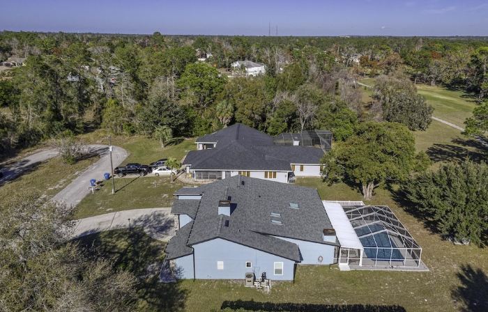 Four Beds, three baths, heated pool, and a Golf Course. What more do you need!!